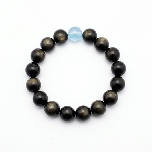 Krysora Aqua Sheen — aquamarine and gold sheen obsidian beads, sea-blue and dark ink on white.