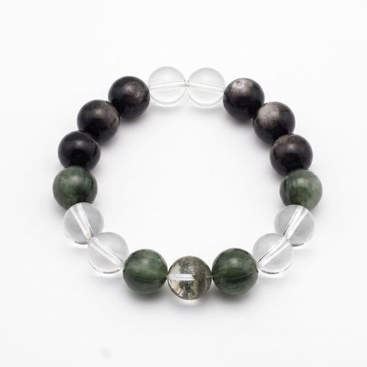 Golden Channel bracelet by Krysora - Silver Sheen Obsidian, Clear Quartz, Green Rutilated and Green Phantom beads, deep silvery Ink and fresh Sage green palette, product photo on white background