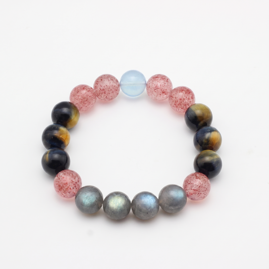 Tri-Sheen bracelet by Krysora - clear blue Aquamarine, warm ochre Tiger's Eye, berry-red Strawberry Quartz, product photo on white background