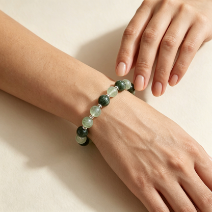 Verdant Radiance on a woman's wrist — fresh sage-green rutilated quartz and prehnite.