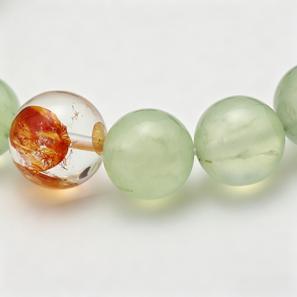 Close-up of the Tri-Cultivate bracelet by Krysora - bead detail, red bloom and natural markings