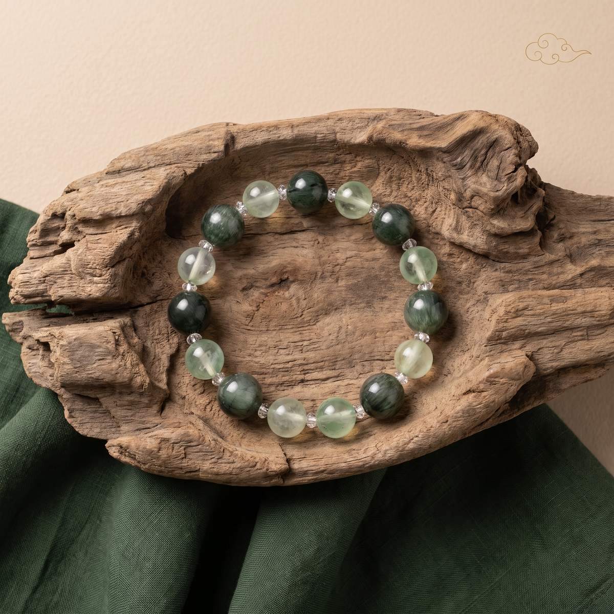 Verdant Radiance bracelet by Krysora in a brand scene -- fresh sage-green rutilated quartz and prehnite beads, styled in natural daylight.