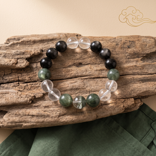 Golden Channel bracelet by Krysora in a brand scene - deep silvery Ink flowing into fresh Sage green