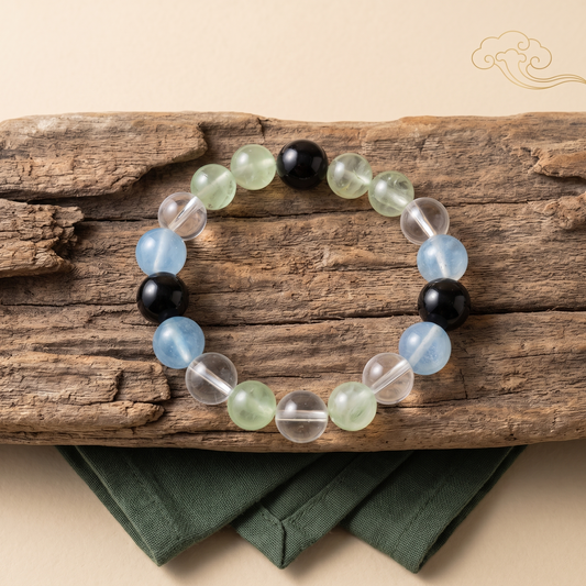 Confluence bracelet by Krysora in a brand scene - deep blue-black, blue-green and living green, a cool gemstone bracelet
