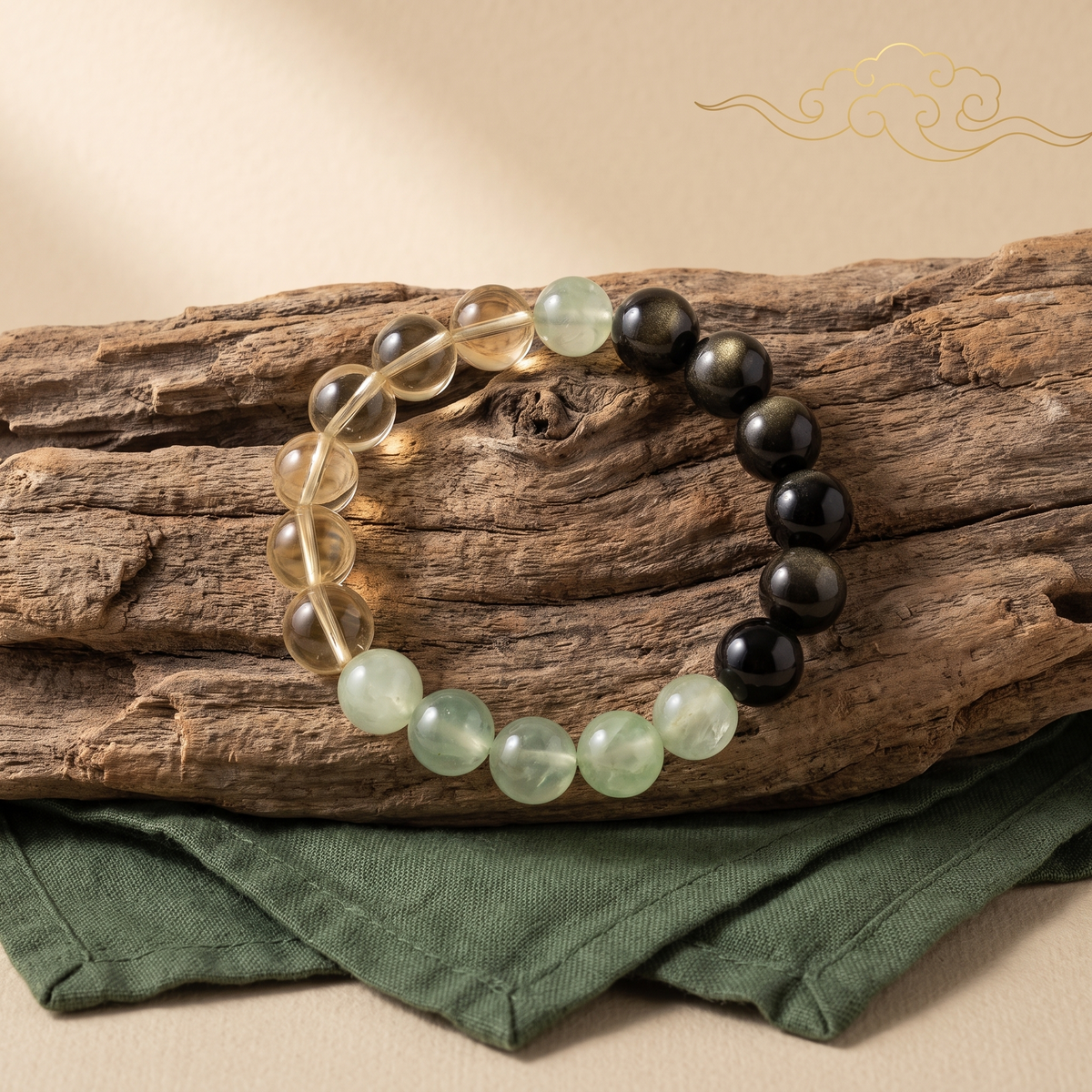Tri-Flourish bracelet by Krysora in a brand scene - a dark, gold, and green three-tone gemstone bracelet