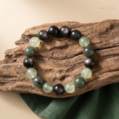 Aqua Verdance bracelet by Krysora in a brand scene - cool ink and fresh sage beads flowing as one