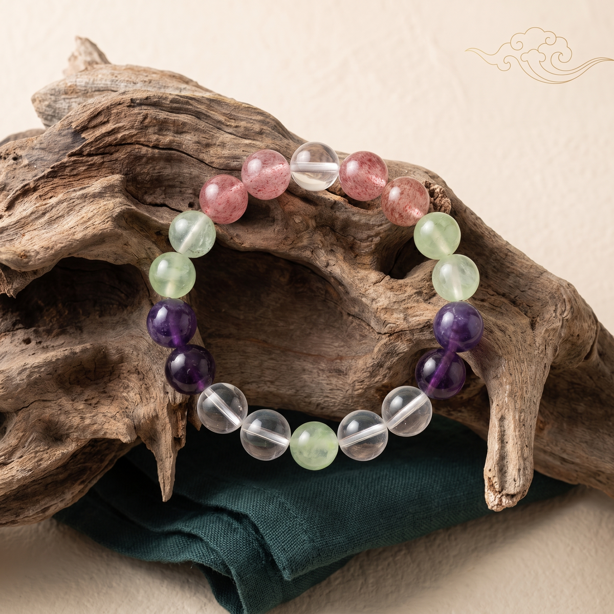 Verdant Blush bracelet by Krysora in a brand scene - verdant green, warm pink-red and violet, a warm gemstone bracelet