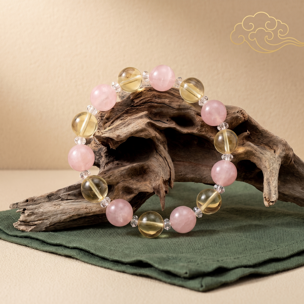 Golden Harvest bracelet by Krysora in a brand scene -- warm citrine gold and blush rose quartz beads, styled in natural daylight.
