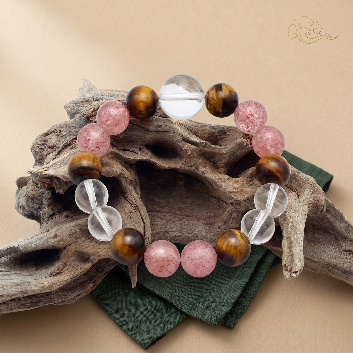 Tawny Blush bracelet by Krysora in a brand scene - warm brown tiger's eye with a soft pink blush, a warm gemstone bracelet
