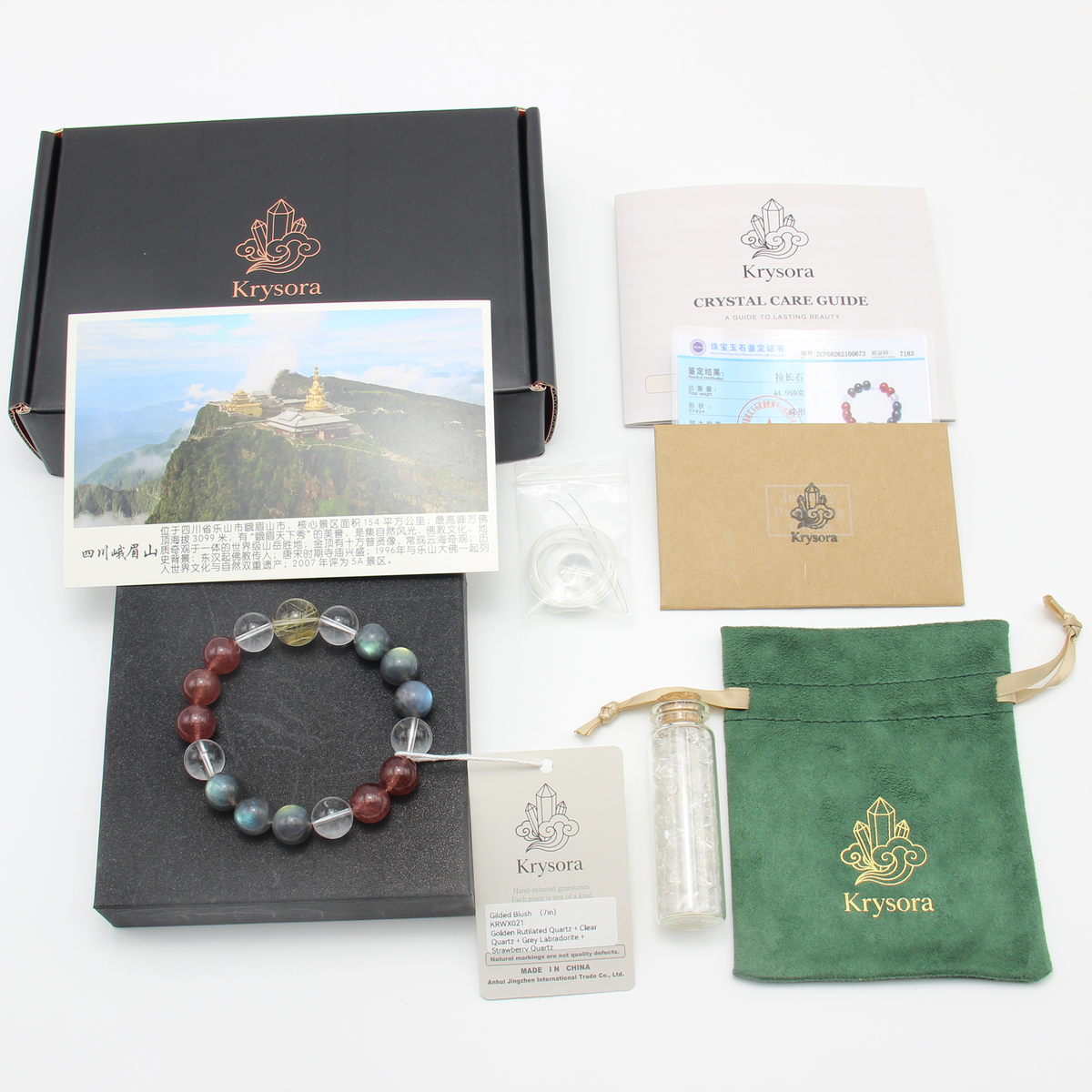 Gilded Blush bracelet by Krysora with its gift packaging - black gift box, velvet pouch, care guide and certificate