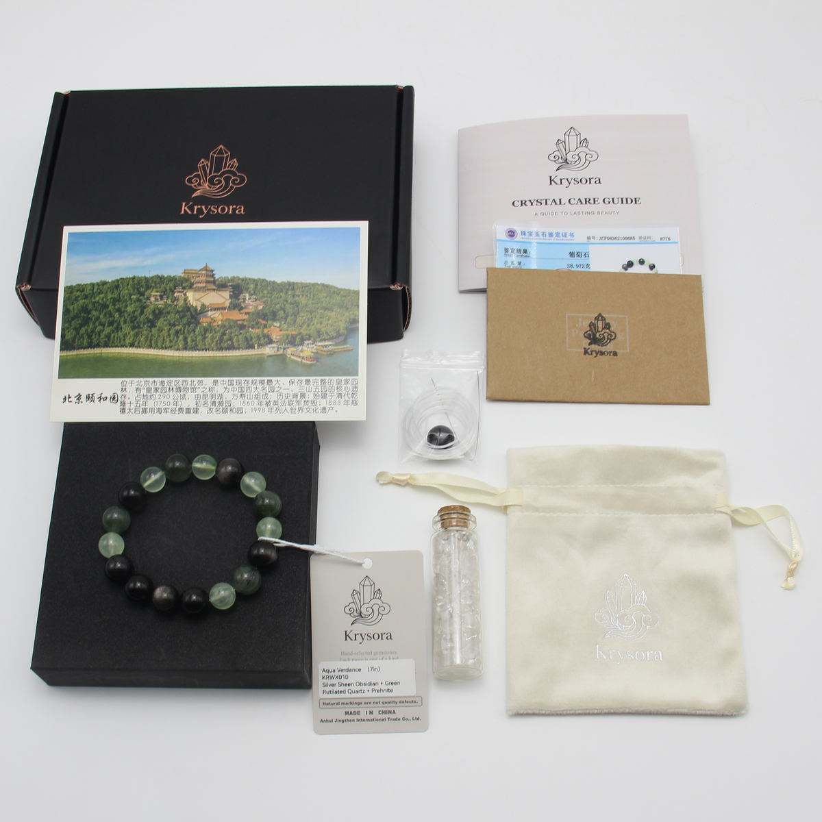 Aqua Verdance bracelet by Krysora with its gift packaging - black gift box, velvet pouch, care guide and certificate