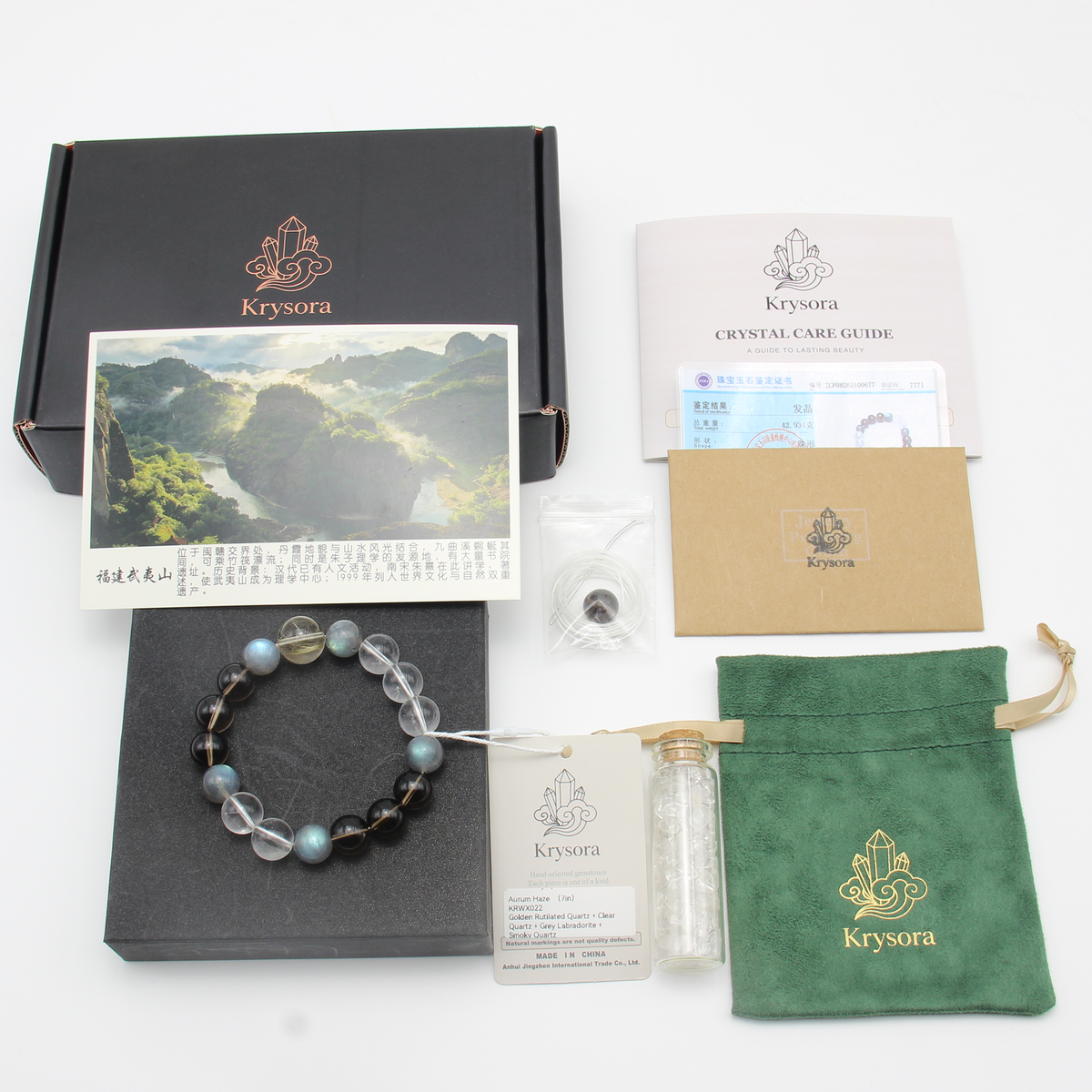 Aurum Haze bracelet by Krysora with its gift packaging - black gift box, velvet pouch, care guide and certificate