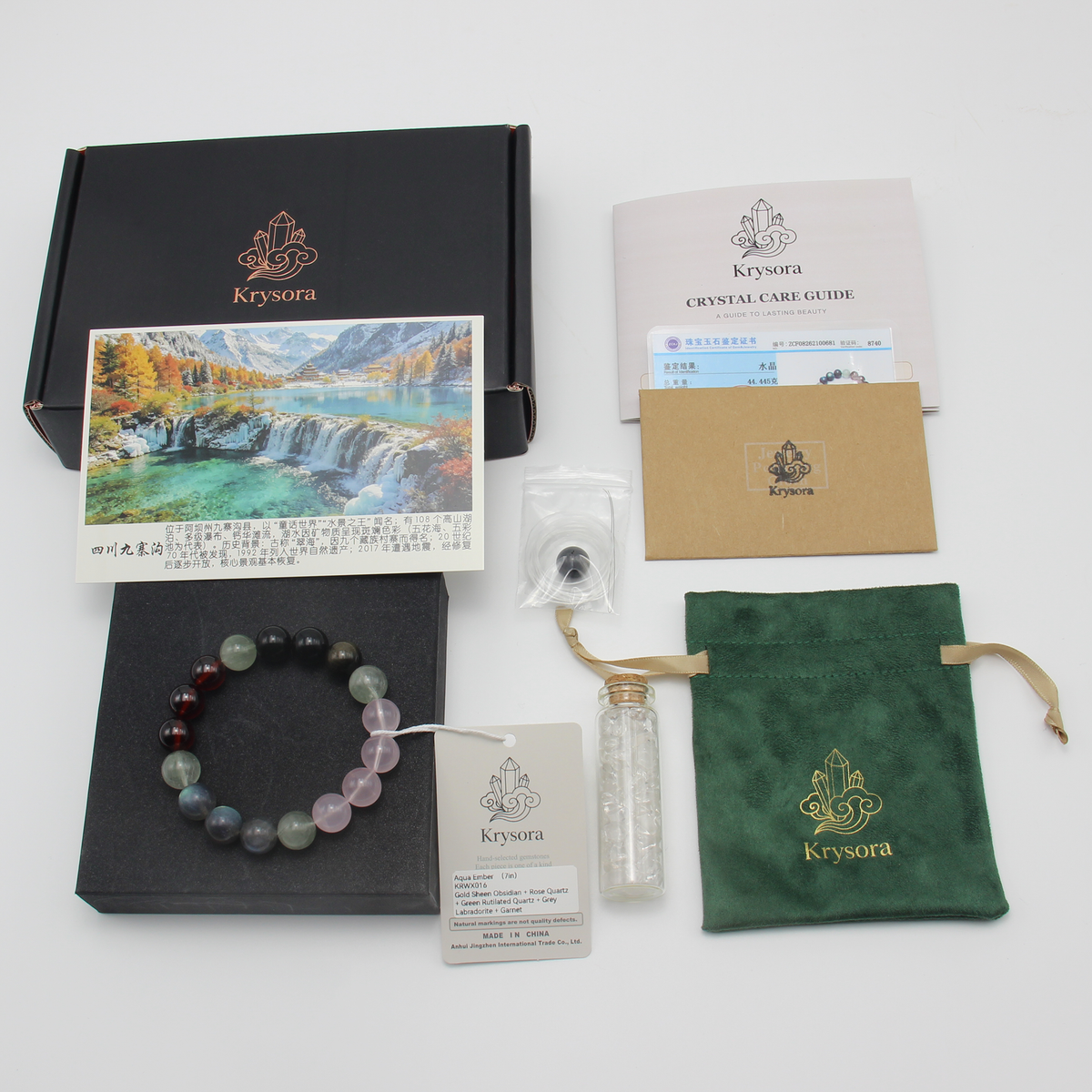 Aqua Ember bracelet by Krysora with its gift packaging - black gift box, velvet pouch, care guide and certificate