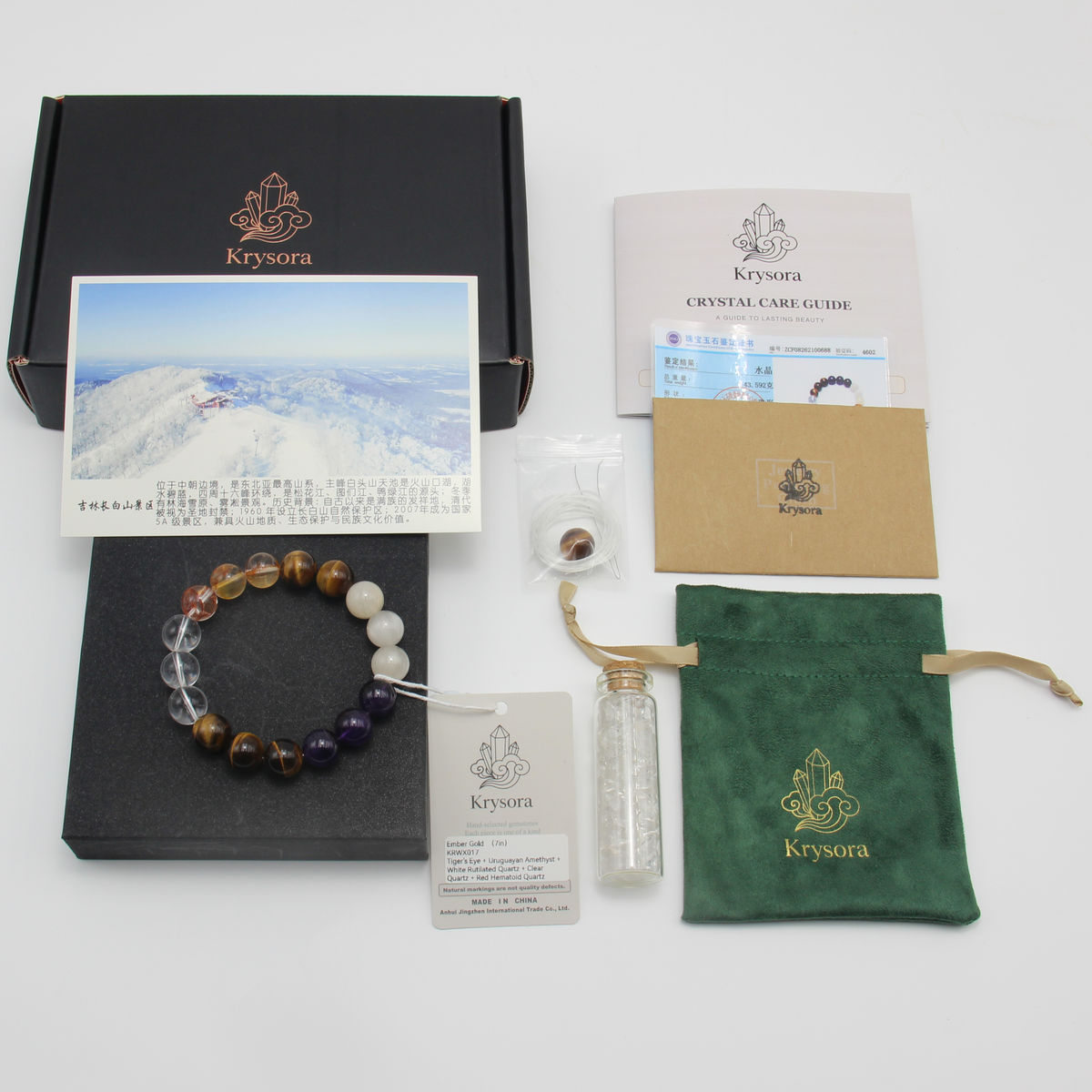 Ember Gold bracelet by Krysora with its gift packaging - black gift box, velvet pouch, care guide and certificate