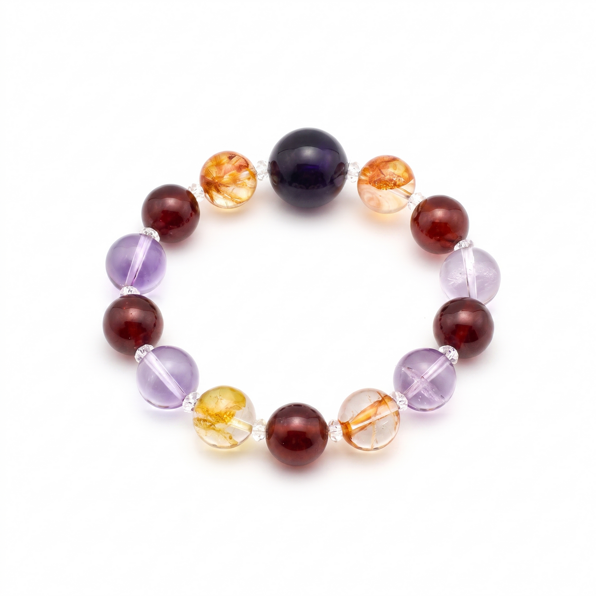Krysora Southern Flame — amethyst, red hematoid quartz and garnet beads, warm purple-red ember glow on white.·