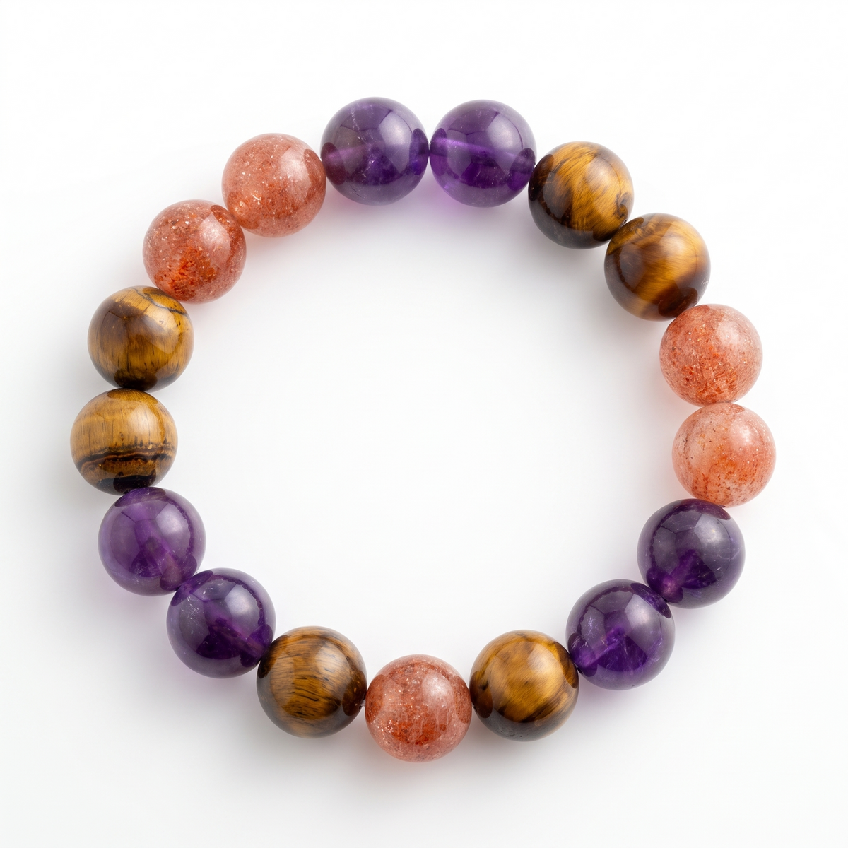 Krysora Solar Blaze — amethyst, golden sunstone and tiger's eye beads, warm gold-purple glow on white.