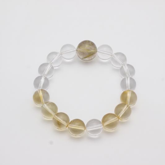 Gilded Radiance bracelet by Krysora - Golden Rutilated Quartz, Citrine, Clear Quartz beads, warm gold and warm clay palette, product photo on white background