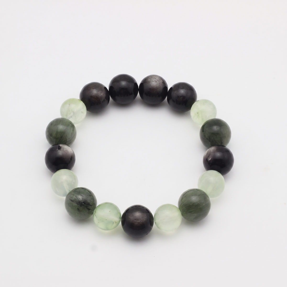 Aqua Verdance bracelet by Krysora - Silver Sheen Obsidian, Green Rutilated Quartz and Prehnite beads, cool ink and fresh sage palette, product photo on white background