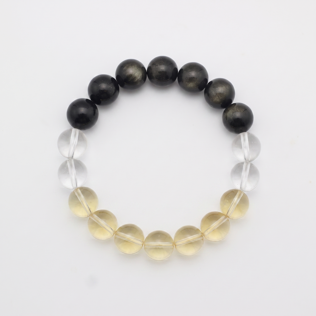 Terra Gold bracelet by Krysora - Golden Sheen Obsidian, Citrine and Clear Quartz beads, deep ink-gold with warm clay-gold palette, product photo on white background
