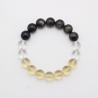 Terra Gold bracelet by Krysora - Golden Sheen Obsidian, Citrine and Clear Quartz beads, deep ink-gold with warm clay-gold palette, product photo on white background