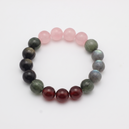 Aqua Ember bracelet by Krysora - Golden Sheen Obsidian, Rose Quartz and Garnet beads with Green Rutilated and Gray Labradorite accents, deep ink and warm ember palette, product photo on white background