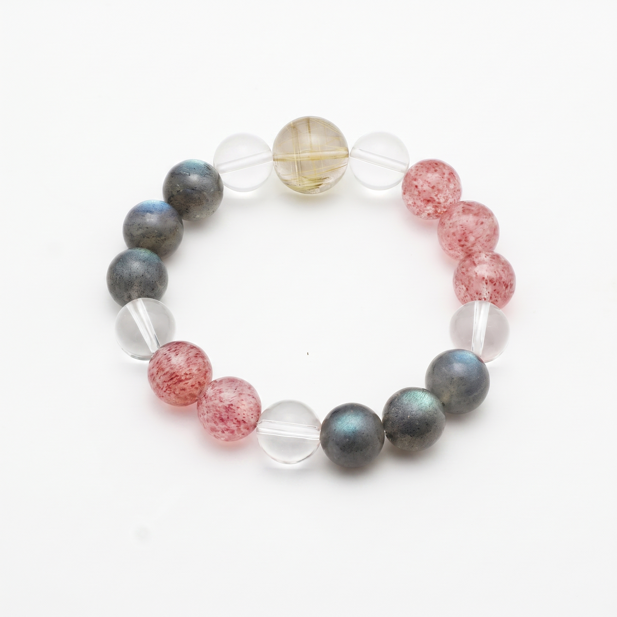 Gilded Blush bracelet by Krysora - Golden Rutilated Quartz and Strawberry Quartz with Clear Quartz and Gray Labradorite, golden and pink palette, product photo on white background
