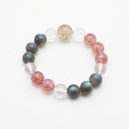 Gilded Blush bracelet by Krysora - Golden Rutilated Quartz and Strawberry Quartz with Clear Quartz and Gray Labradorite, golden and pink palette, product photo on white background