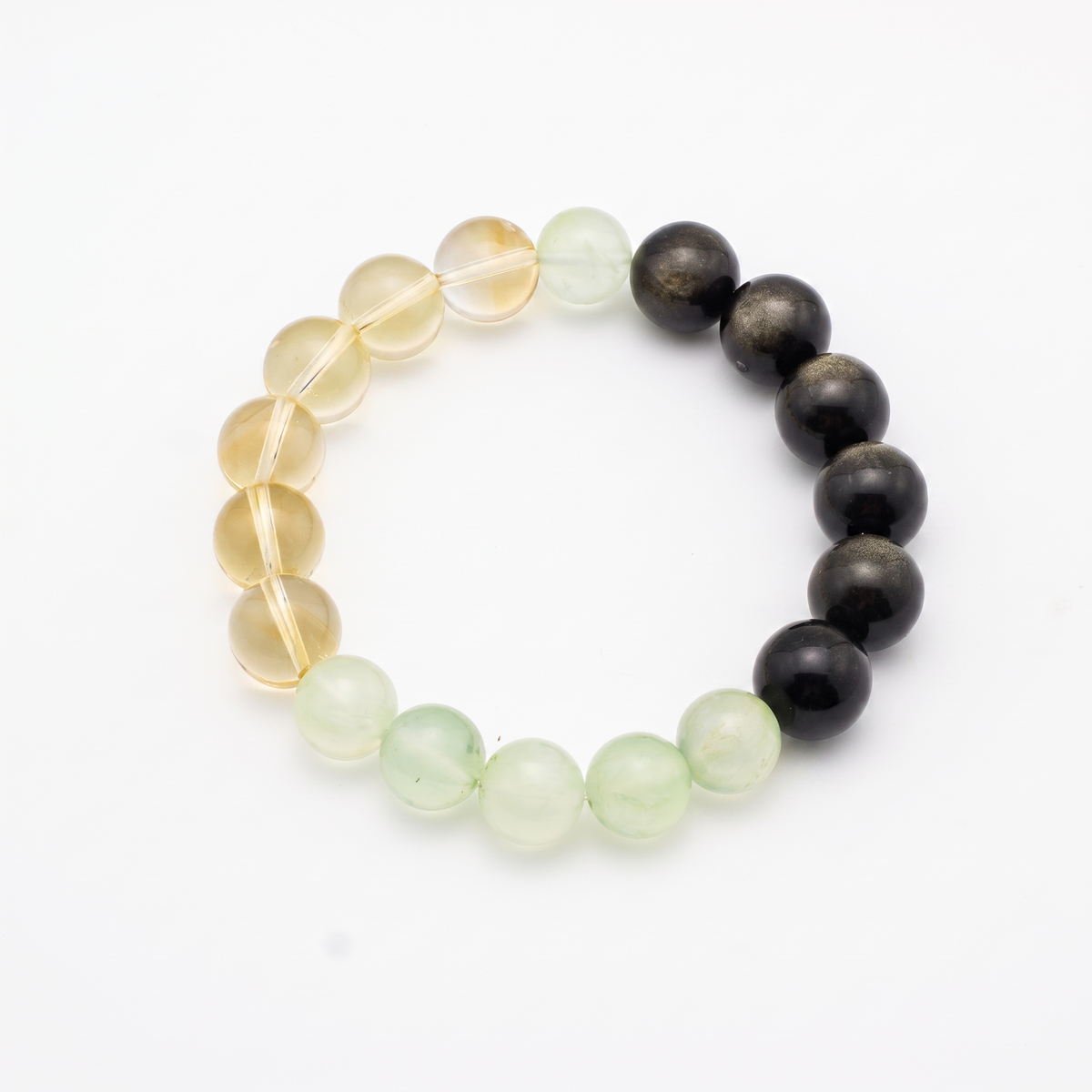 Tri-Flourish bracelet by Krysora - black Gold Sheen Obsidian with honey-gold Citrine and soft green Prehnite, product photo on white background