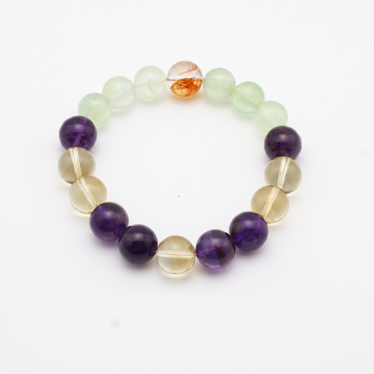 Tri-Cultivate bracelet by Krysora - Red Hematoid Quartz, Citrine, Prehnite and Amethyst beads, product photo on white background