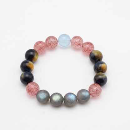 Tri-Sheen bracelet by Krysora - clear blue Aquamarine, warm ochre Tiger's Eye, berry-red Strawberry Quartz, product photo on white background